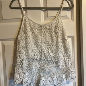 Like new summer top..worn only a few times. Smoke free home.